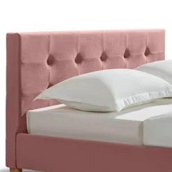 Lit en velours avec pieds en bois