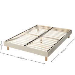 Lit tissu beige avec tête de lit bouclette