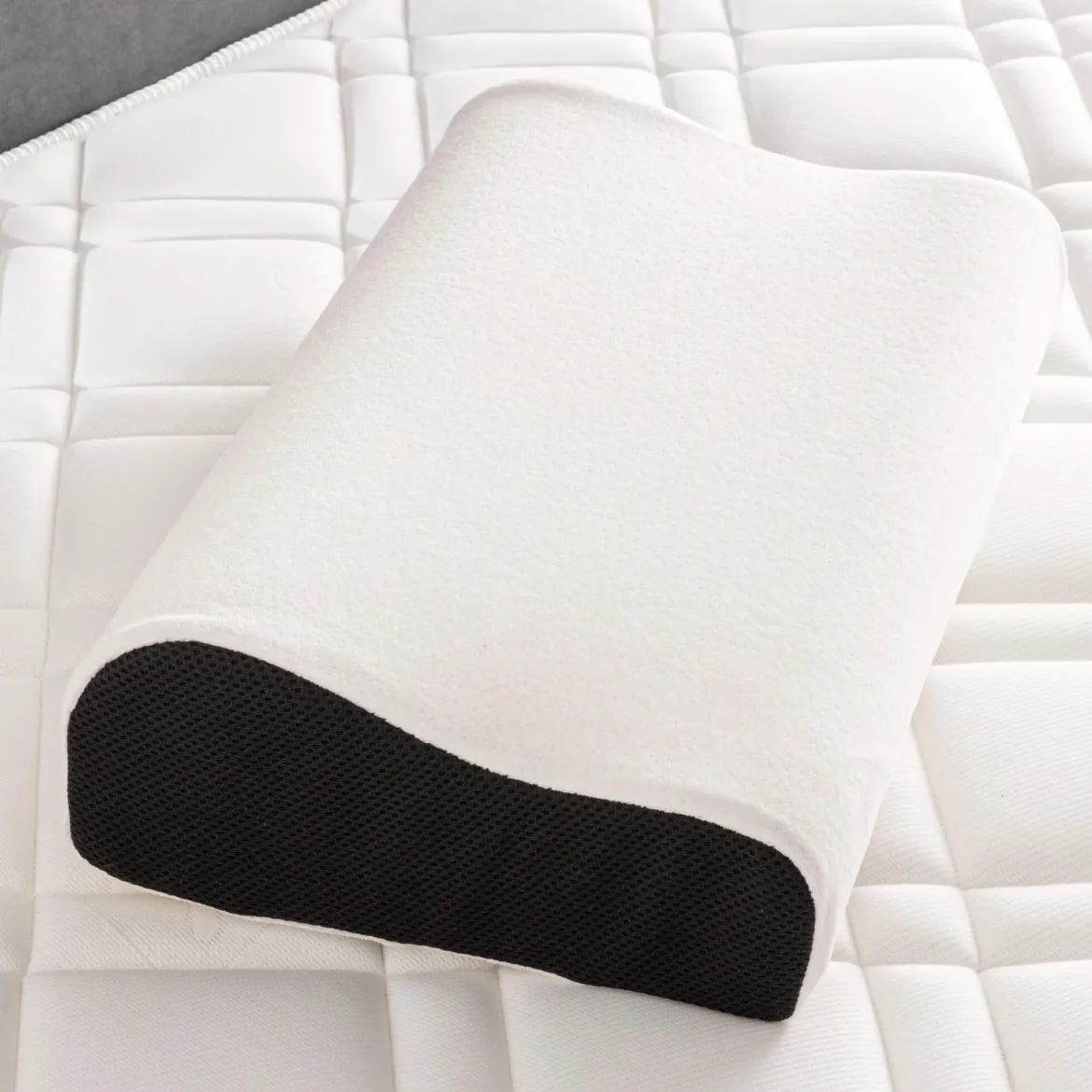 Oreiller ergonomique Bultex à mémoire de forme 33x52