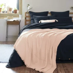 Plaid gaze de coton à franges