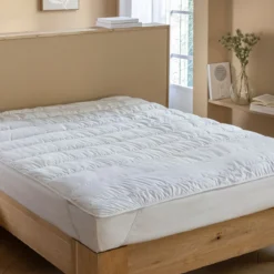 Surmatelas moelleux anti-acariens Terre de Nuit